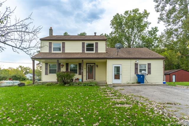 front view picture of 8033 Lambs Rd, Goodells, MI. 48027