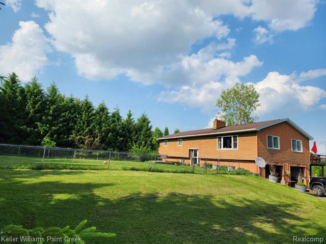 front view picture of 370 Wales Ridge Rd, Goodells, MI. 48027