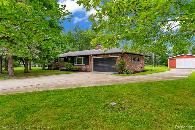 front view picture of 10990 Smiths Creek Rd, Memphis, MI. 48041