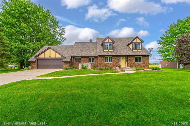 front view picture of 9594 Marquette Rd, Goodells, MI. 48027