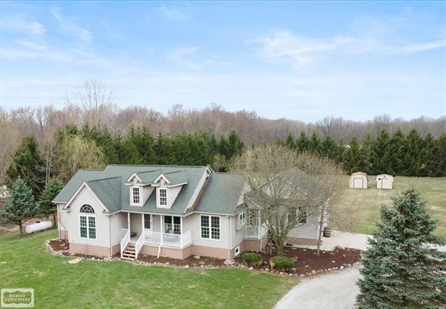 front view picture of 2455 Cove Rd, Goodells, MI. 48027