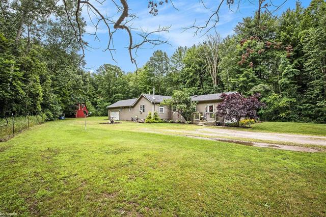 front view picture of 2650 Castor Rd, Goodells, MI. 48027