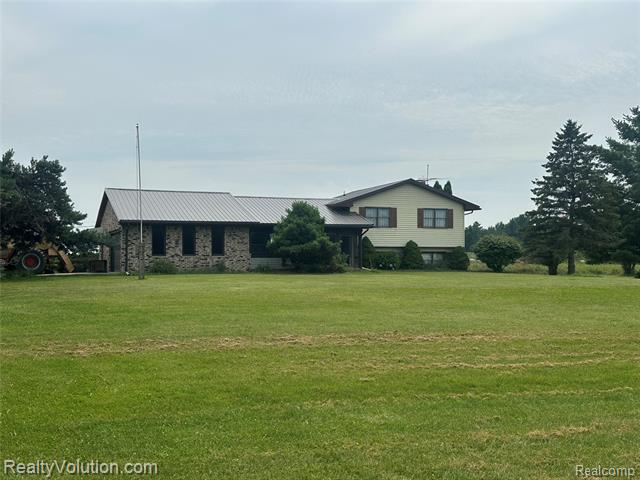 front view picture of 12749 Burt Rd, Memphis, MI. 48041