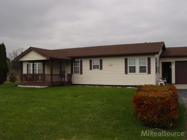 front view picture of 9310 Hill Rd, Goodells, MI. 48027