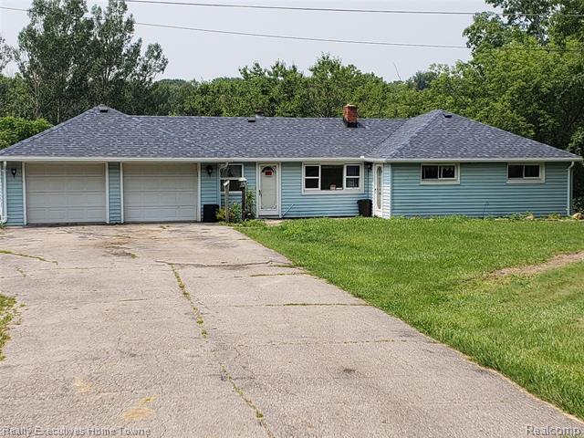 front view picture of 4770 Atkins Rd, North Street, MI. 48049