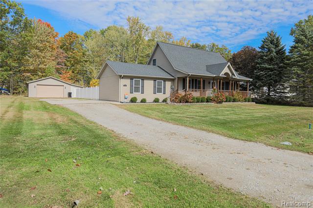 front view picture of 5230 Robinwood Dr, North Street, MI. 48049