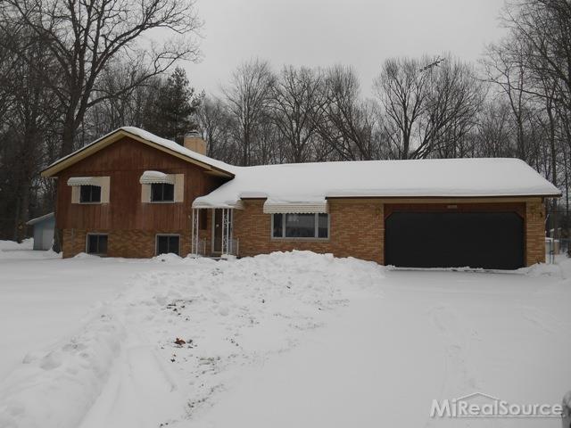 front view picture of 3098 Negaunee Tr, North Street, MI. 48049