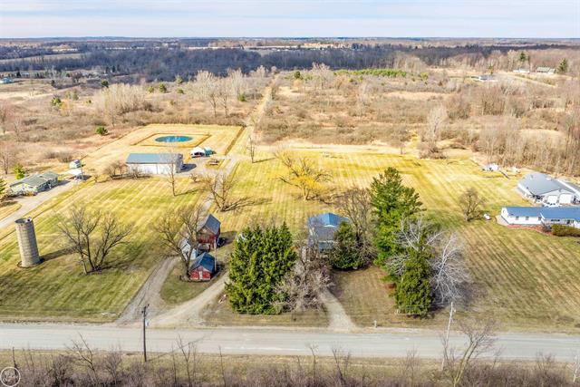front view picture of 15594 Bryce Rd, Capac, MI. 48014