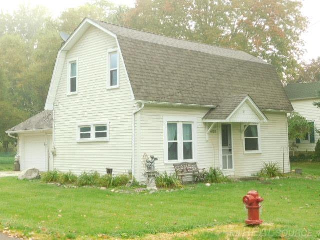 front view picture of 401 Mill St, Capac, MI. 48014