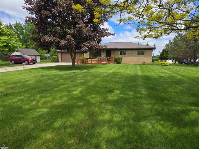 front view picture of 13126 Imlay City Rd, Emmett, MI. 48022