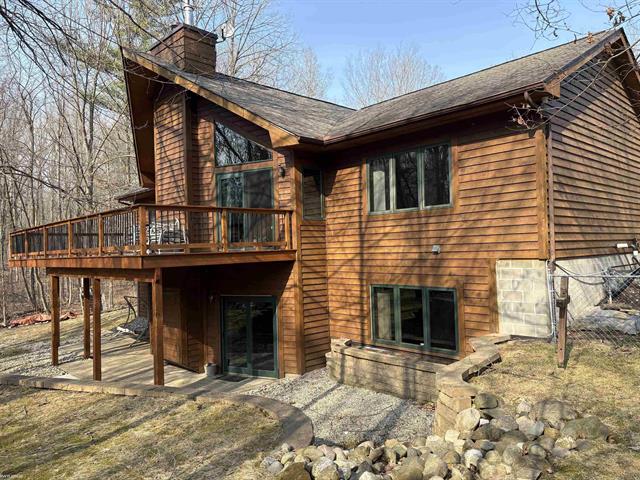 front view picture of 5575 River Ridge Tr, North Street, MI. 48049