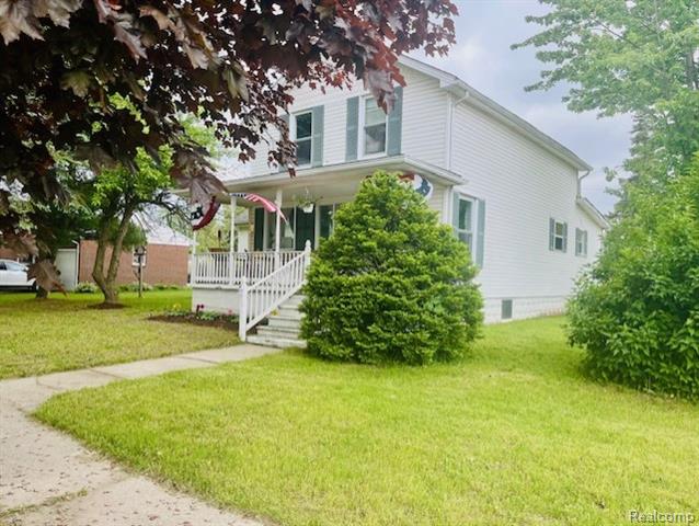front view picture of 203 N Main St, Capac, MI. 48014