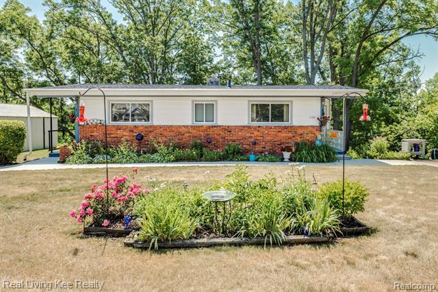front view picture of 4569 North River Rd, North Street, MI. 48049