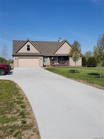front view picture of 5867 Capac Rd, Capac, MI. 48014