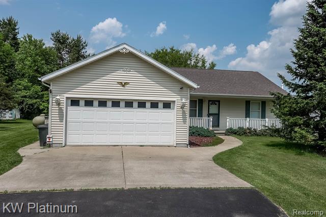 front view picture of 7448 Avoca Rd, North Street, MI. 48049