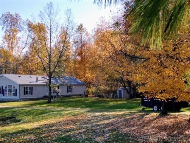 front view picture of 5901 Quain Rd, Emmett, MI. 48022