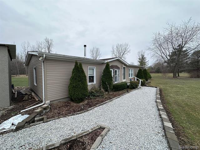 front view picture of 13027 Norman Rd, Yale, MI. 48097