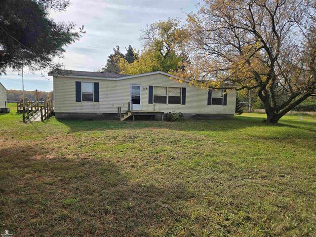 front view picture of 7723 Yale Rd, Avoca, MI. 48006