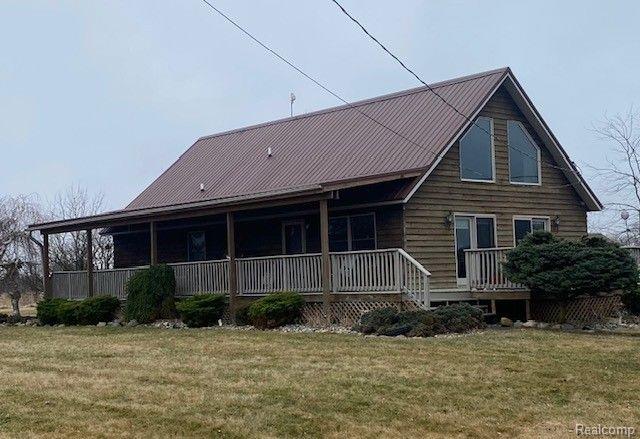 front view picture of 8803 Winn Rd, Brown City, MI. 48416