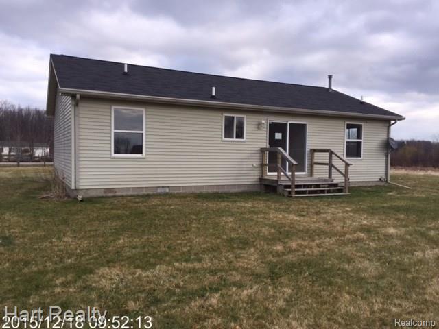 front view picture of 8911 Fisher Rd, Avoca, MI. 48006