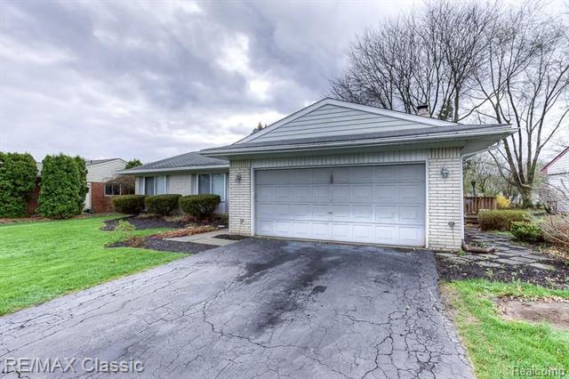 front view picture of 22621 Brook Forest Rd, Novi, MI. 48375