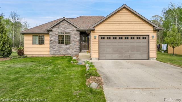 front view picture of 1050 Wales Ridge Rd, Goodells, MI. 48027