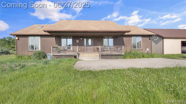 front view picture of 5050 Burton Rd, Capac, MI. 48014