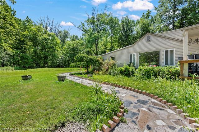 front view picture of 45055 Mcbride Ave, Belleville, MI. 48111