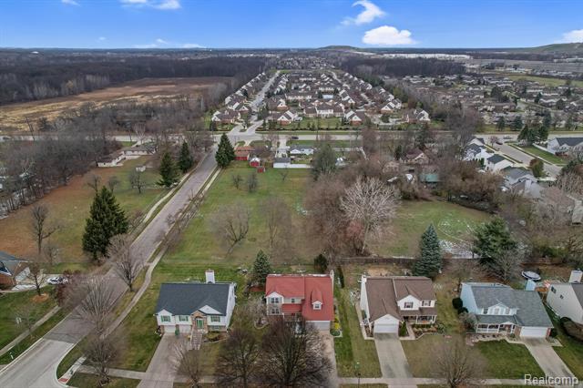 front view picture of 42860 Berkdale Dr, Belleville, MI. 48111