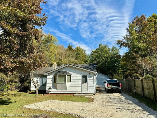 front view picture of 7683 Beck Rd, Belleville, MI. 48111