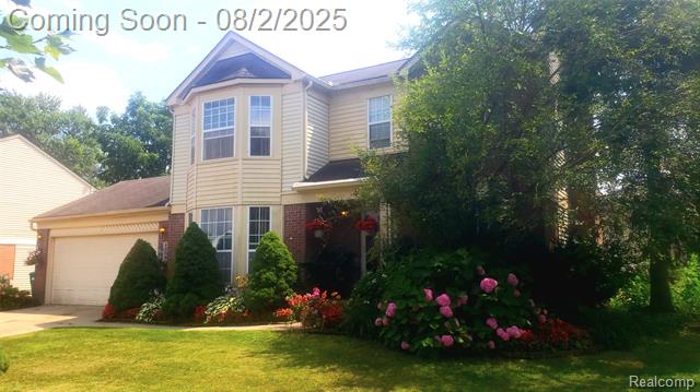 front view picture of 45381 Greenbriar Dr, Belleville, MI. 48111