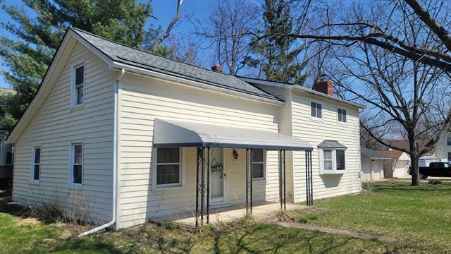 front view picture of 49450 Cross St, Belleville, MI. 48111