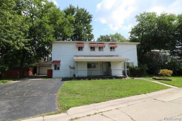 front view picture of 32260 Oscoda, Westland, MI. 48186