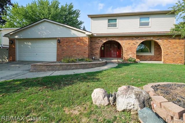 front view picture of 40526 Village Oaks Rd, Novi, MI. 48375